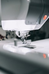 white sewing machine sewing machine
