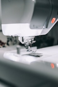 white sewing machine sewing machine