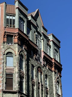 Historic building facade with ornate details and stonework.