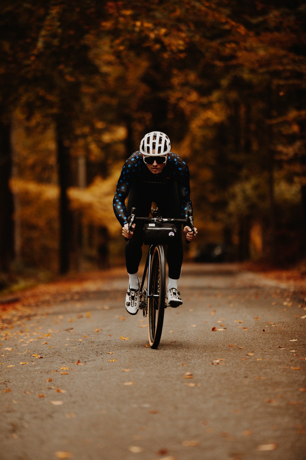 man in black jacket riding motorcycle on road during daytime