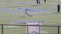 Close-up of a football player in action during a local Iraqi match.