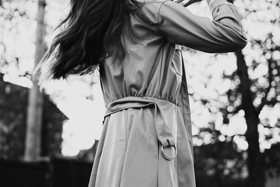 grayscale photo of woman in white dress