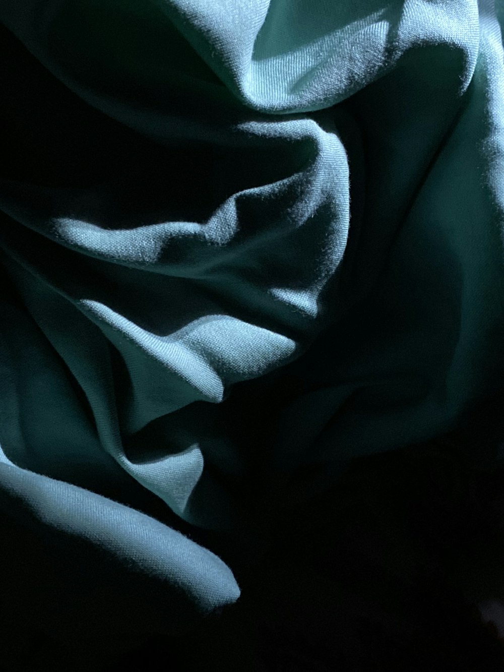 blue textile in close up photography