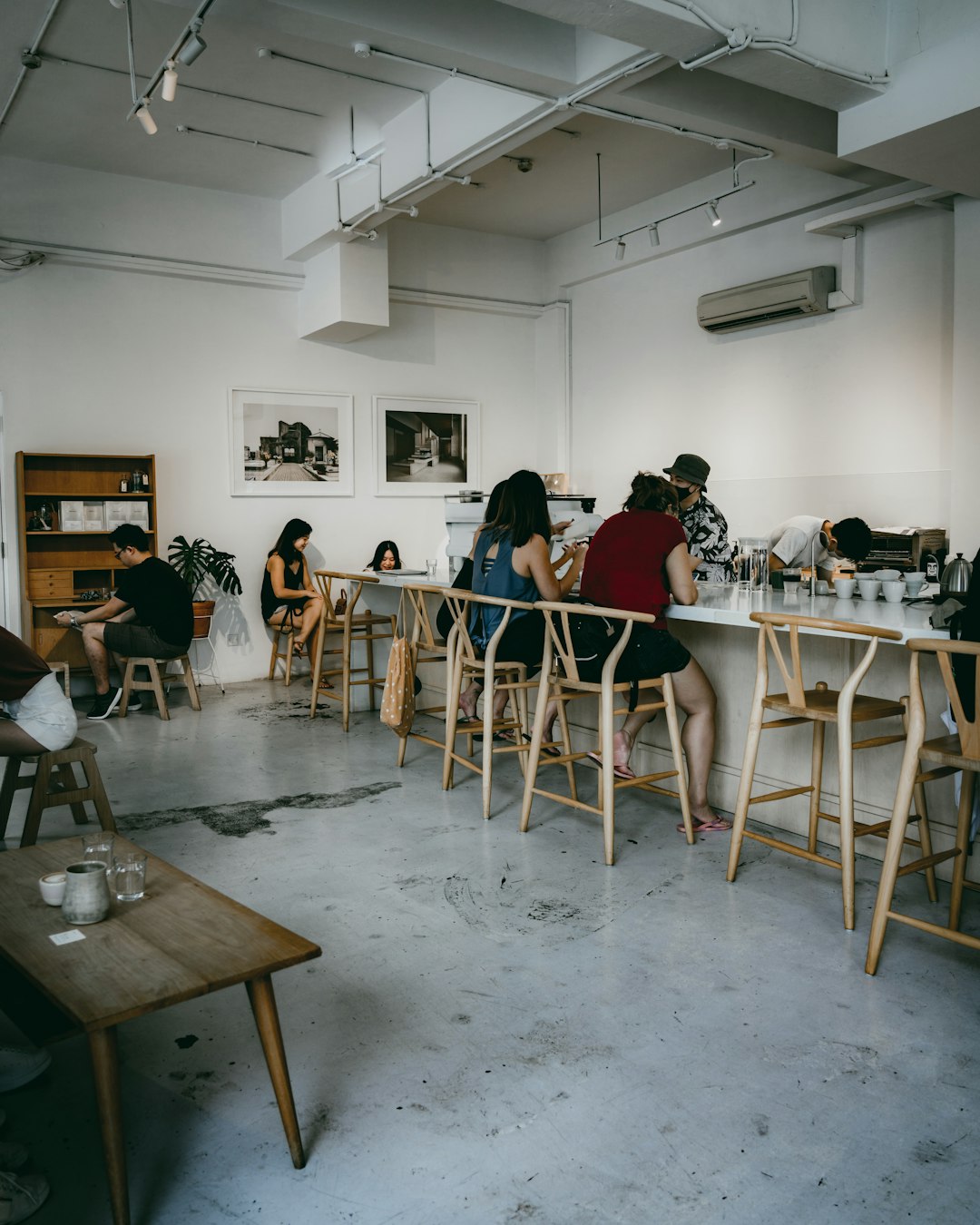 people sitting on chairs inside room