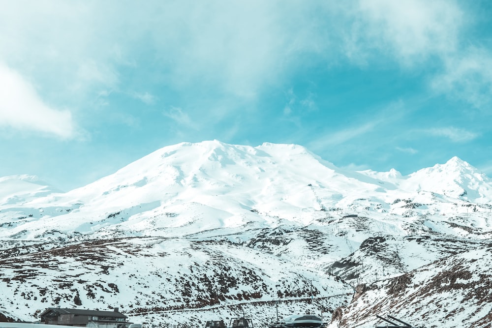 snow covered mountain under blue sky during daytime