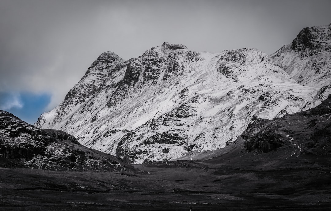 snow covered mountain during daytime