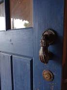 Close-up of a wooden door freshly painted with a smooth glossy finish