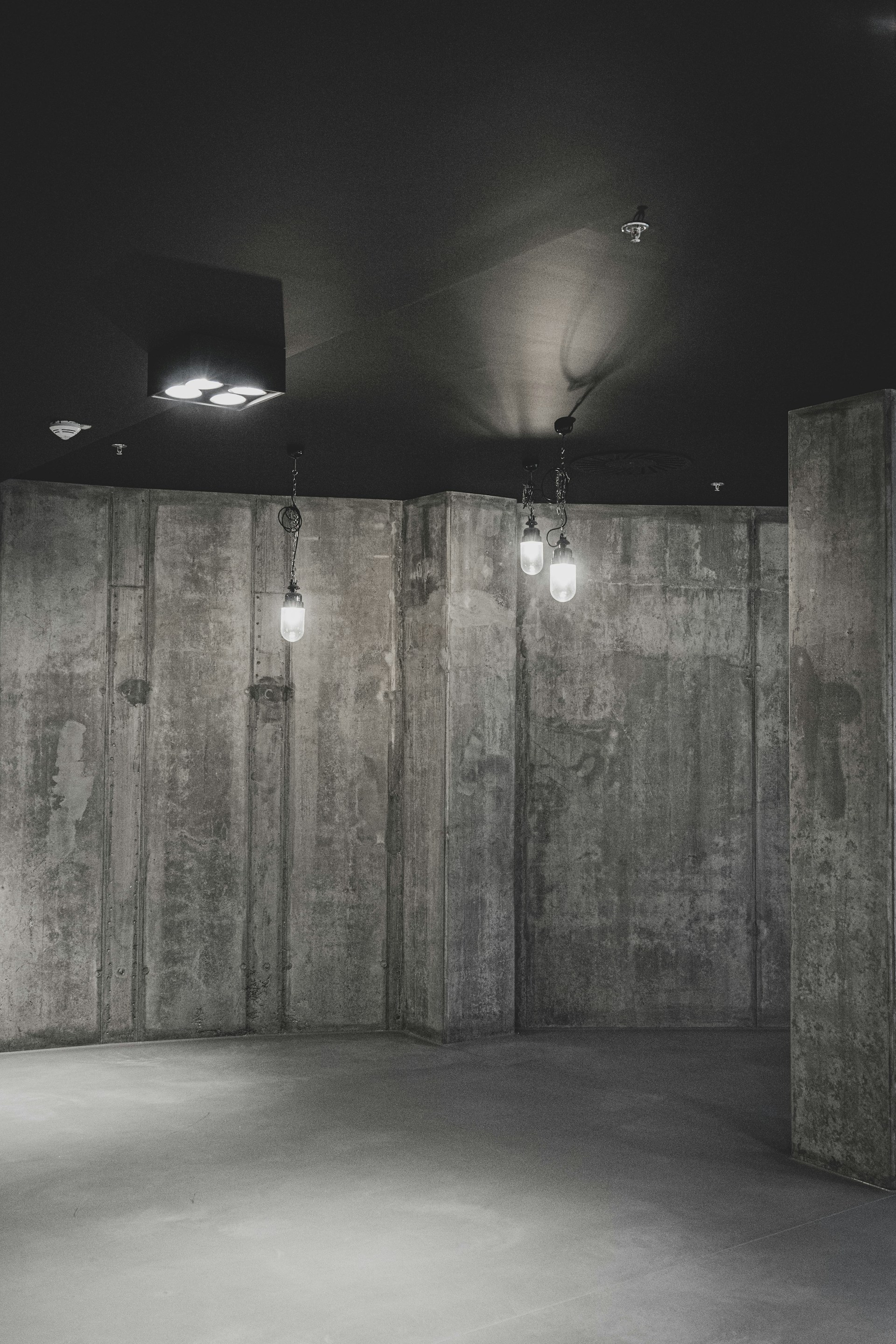 A commercial office fit-out showcasing polished concrete floors and minimalist design elements.