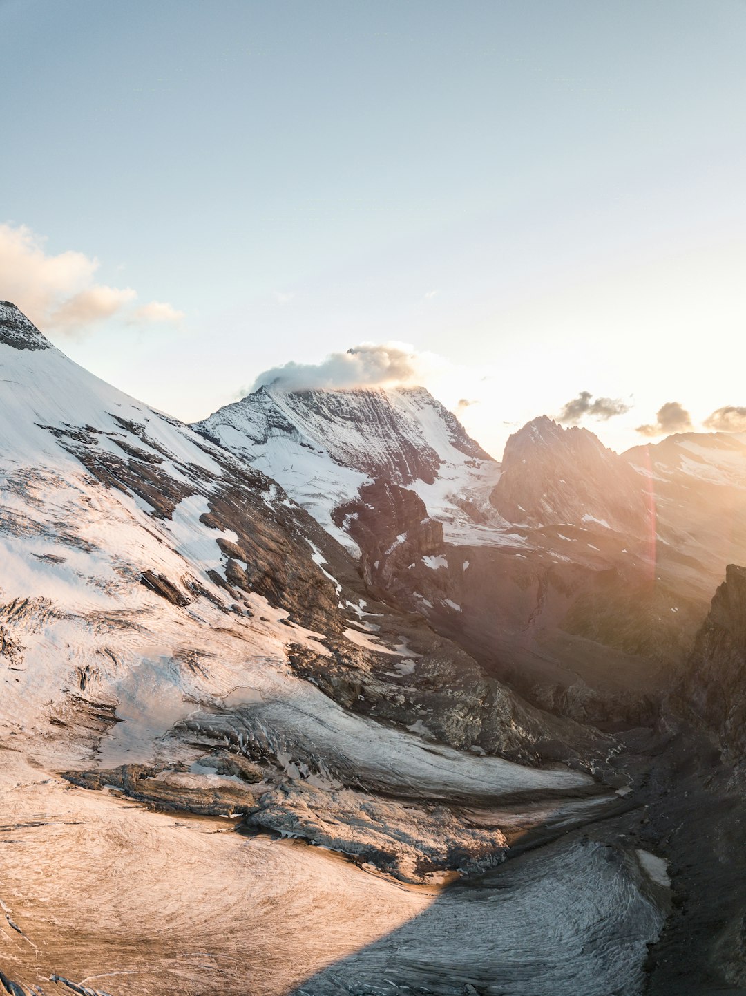 snow covered mountain during daytime