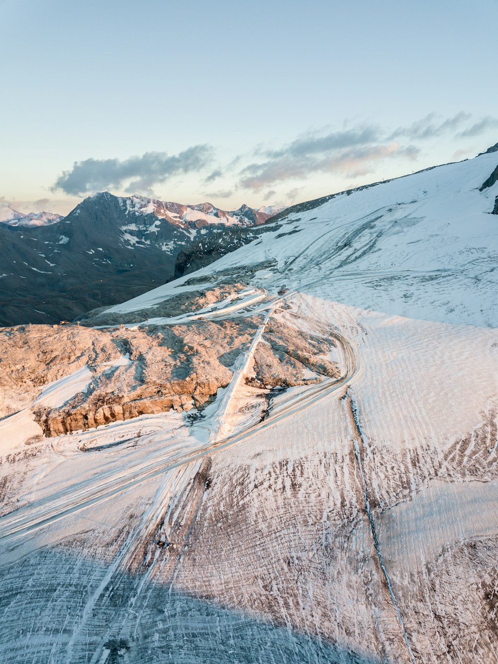 snow covered mountain during daytime