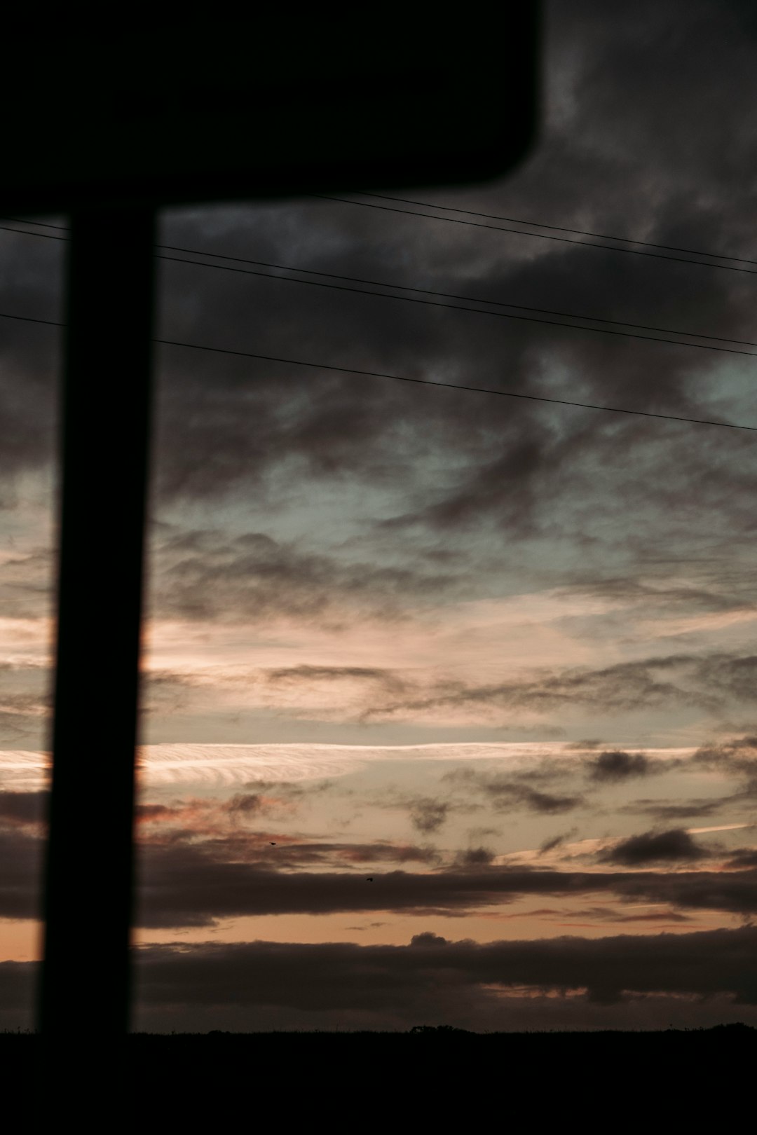 black clouds during golden hour