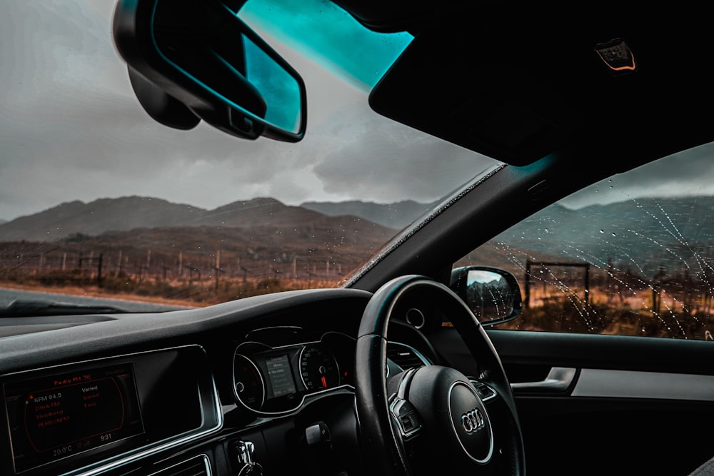 black and red car steering wheel