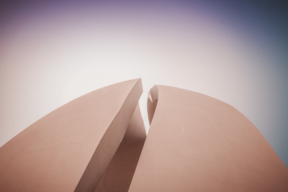 brown concrete building under blue sky during daytime