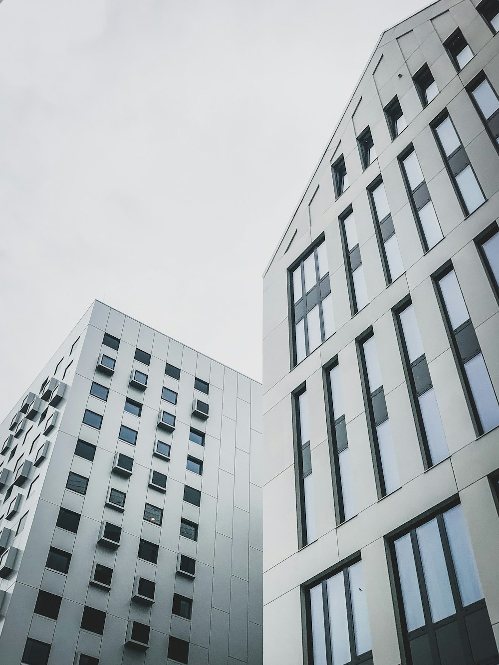 white concrete building under white sky