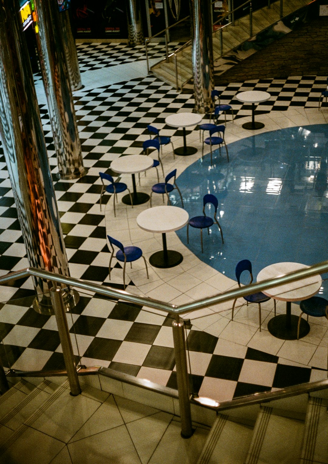 white and blue round table and chairs