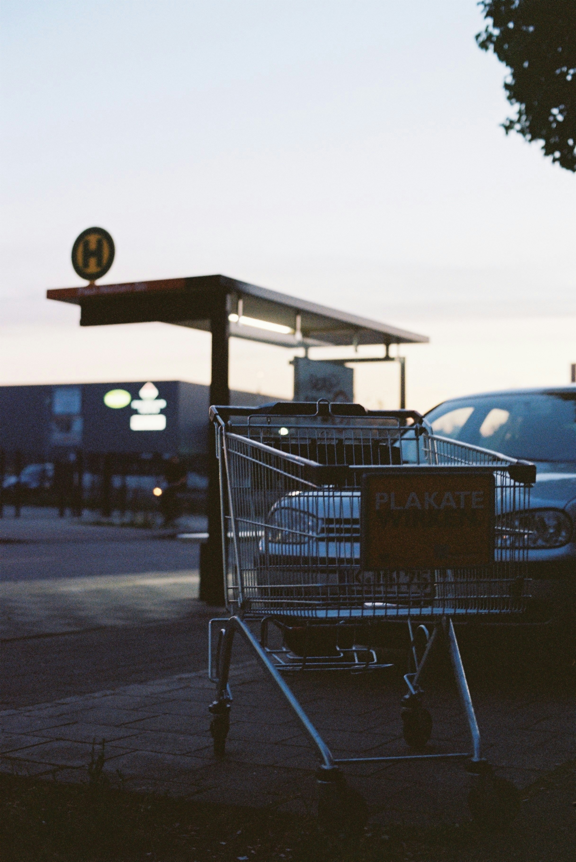 blue car parked on the street