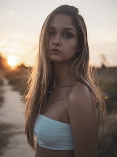 woman in blue tube top