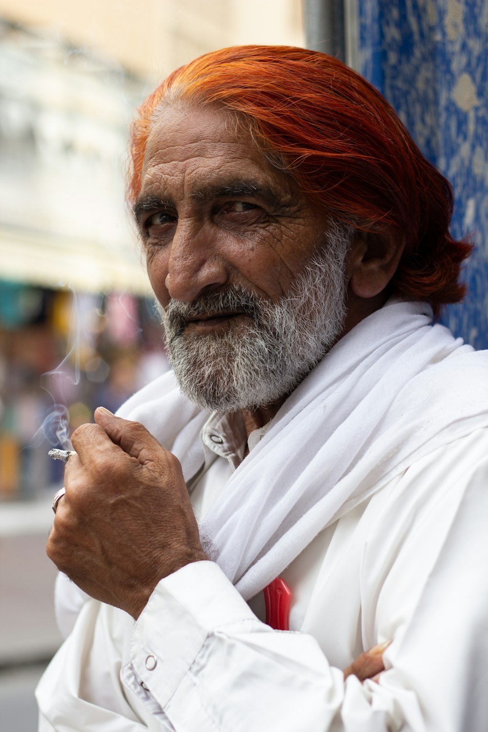 man in white dress shirt with red hair