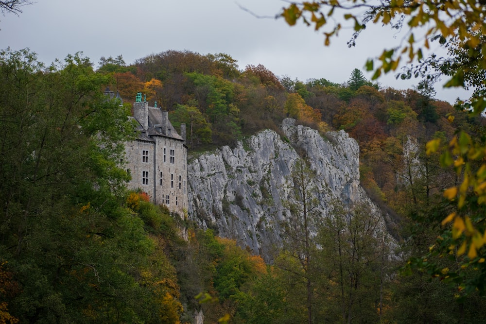 white concrete building on top of mountain