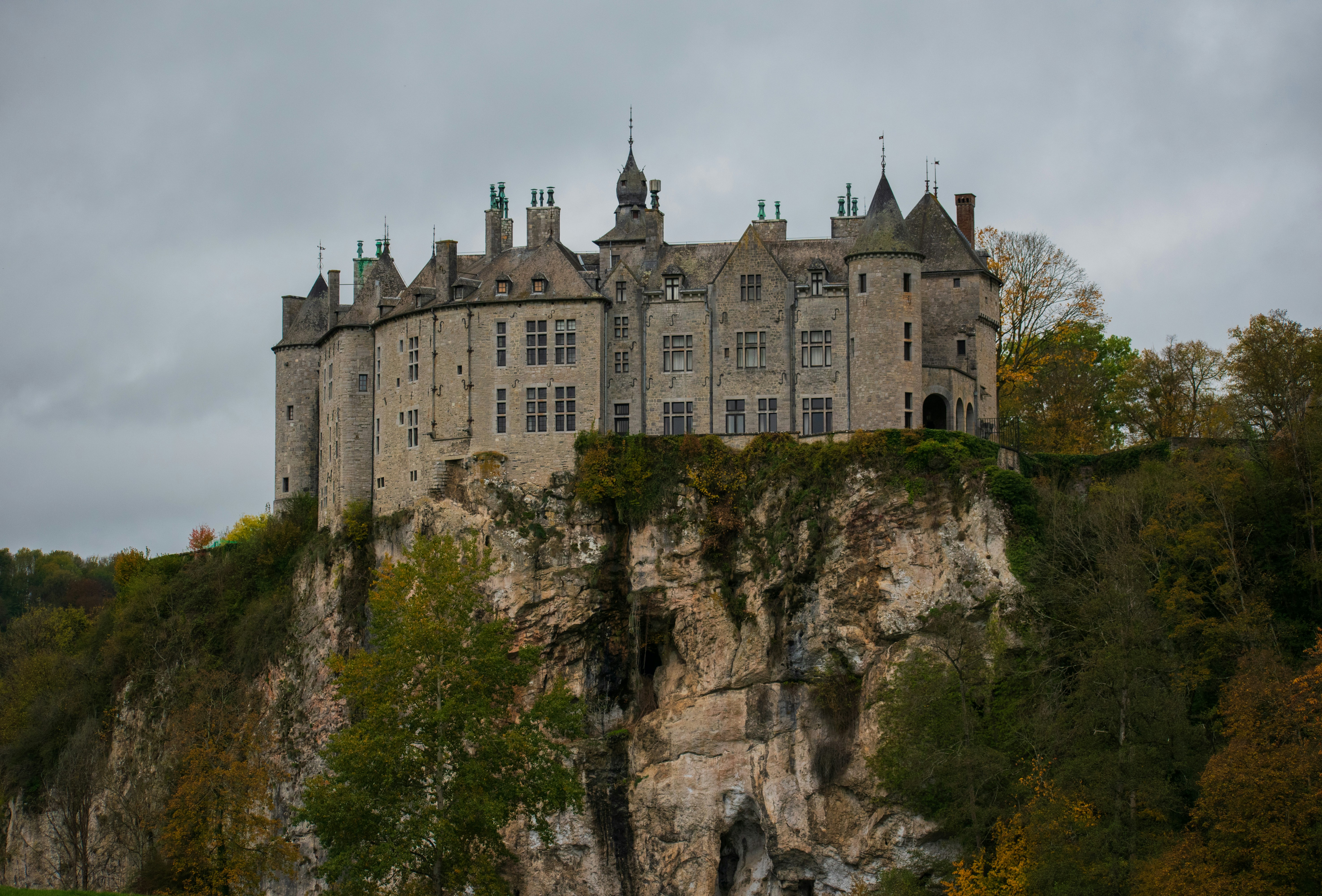 gray concrete castle on cliff, Walzin Castle in Belgium