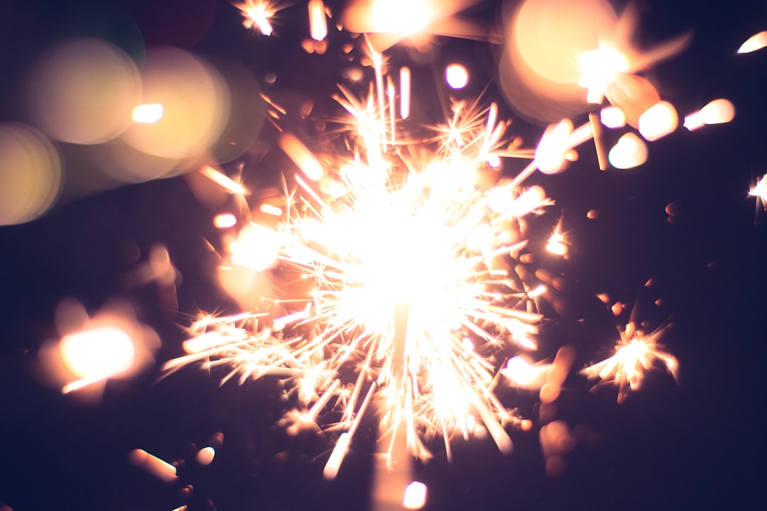 white and yellow fireworks during nighttime