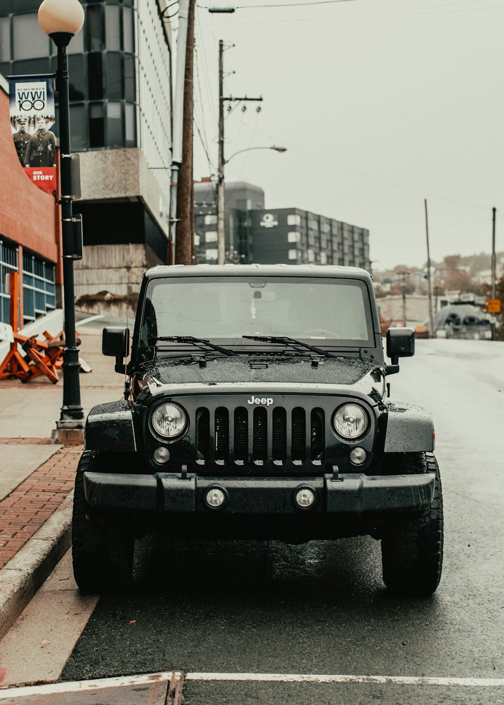 black jeep wrangler on road during daytime