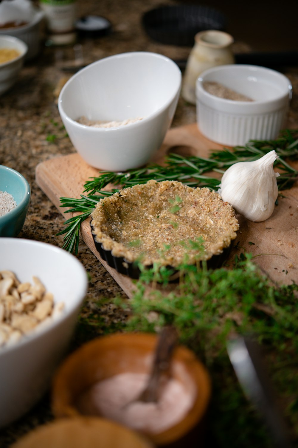 brown and white round food on brown wooden tray