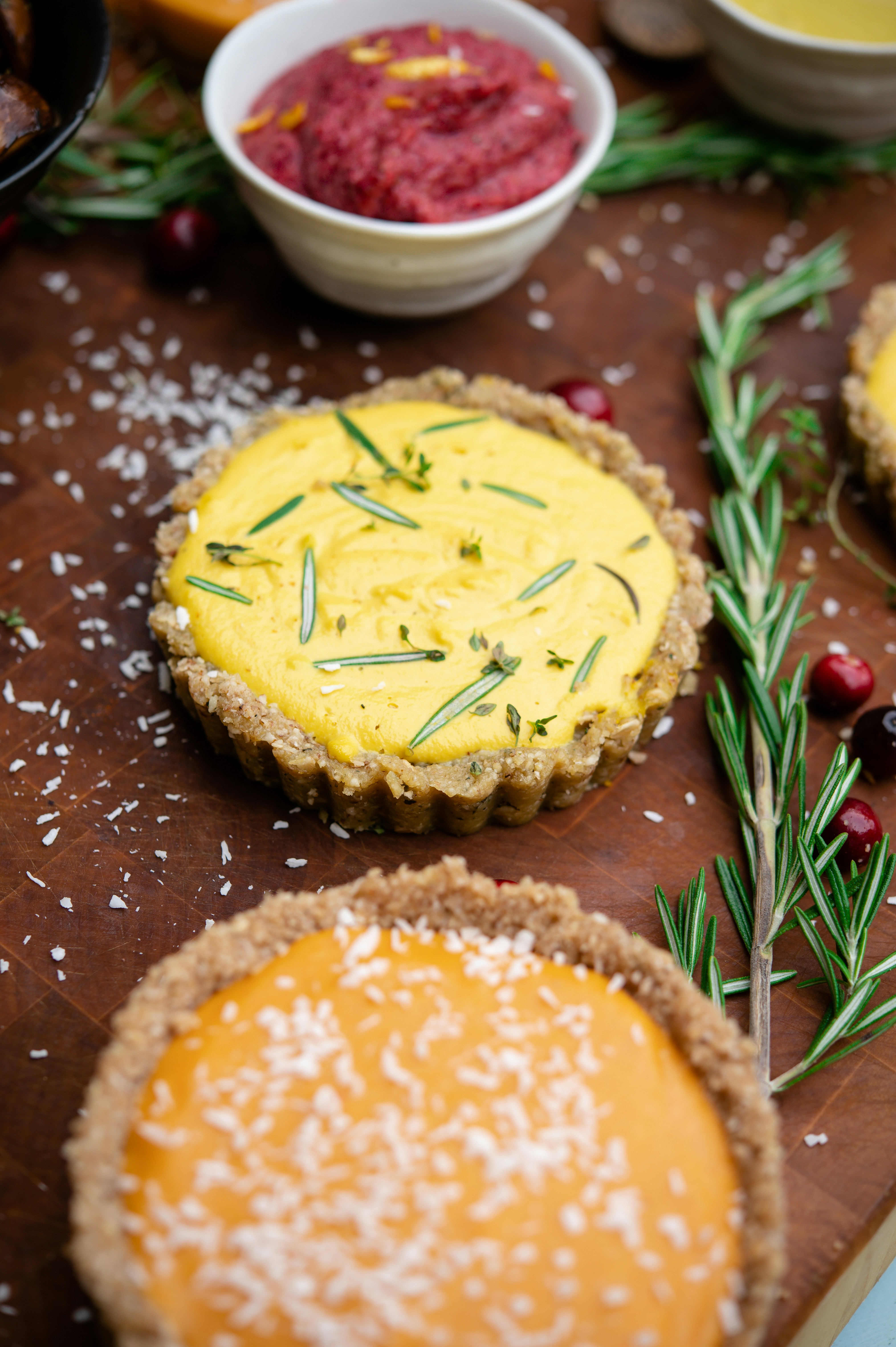 yellow and white round cake on brown wooden table