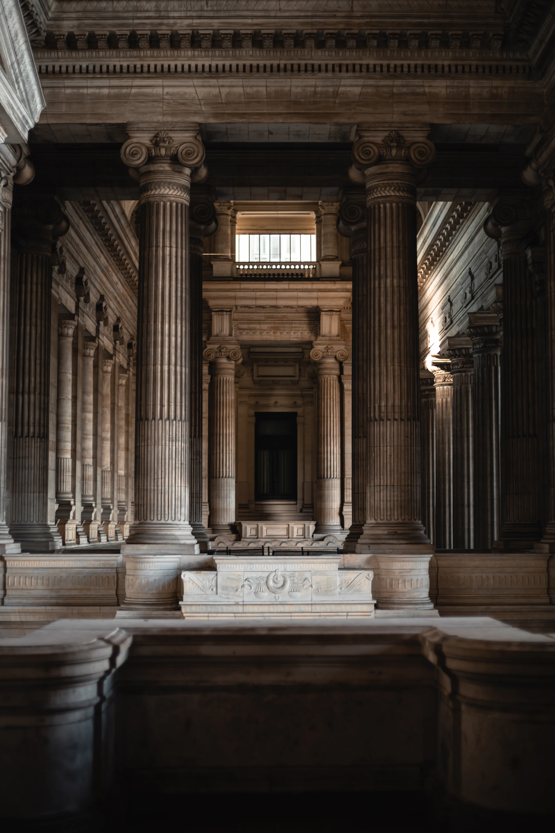 Stone columns inside the Palace of Justice in Brussels.