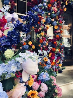 A close-up of freshly planted colorful seasonal flowers creating a welcoming entrance.