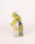 A beautifully wrapped gift set of amraya attars resting on a polished wooden table with soft lighting.