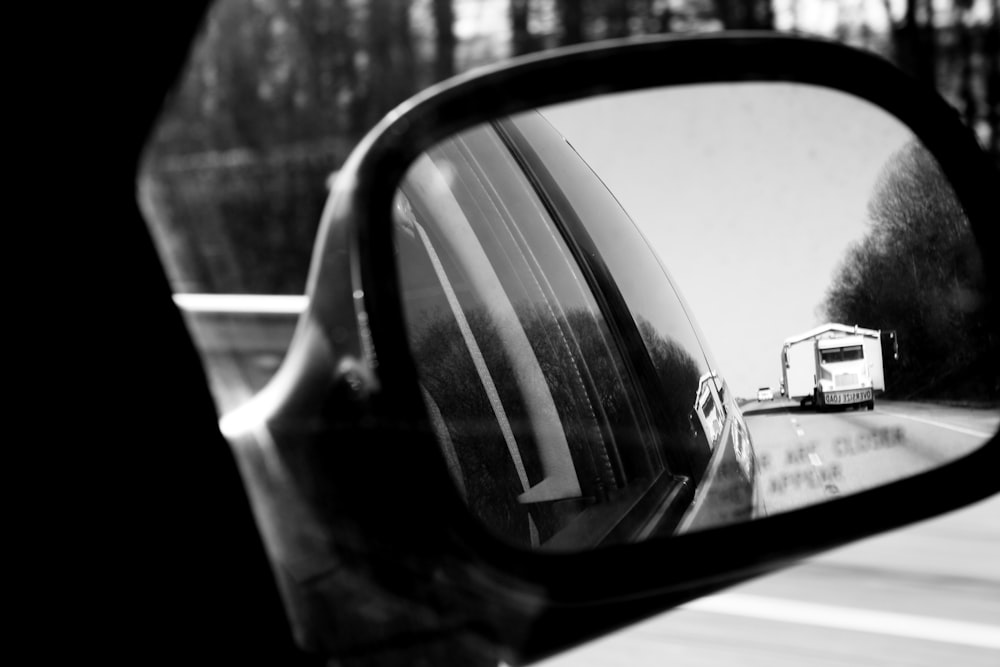 car side mirror showing car