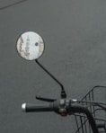 black and white bicycle with white round sticker
