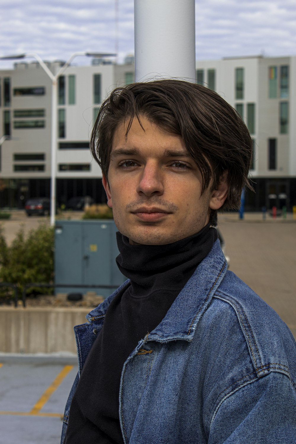 man in blue denim jacket