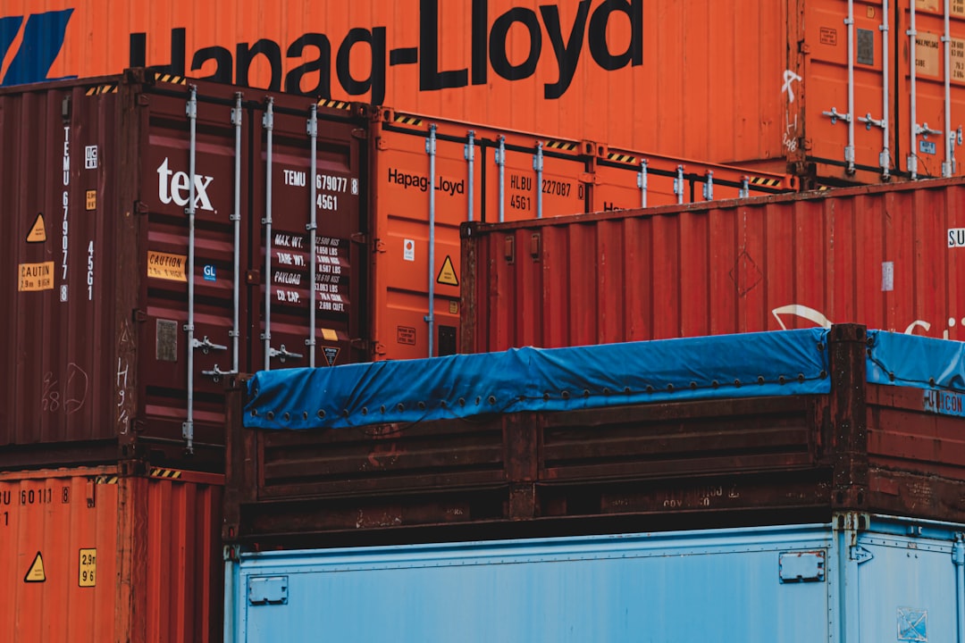 blue and orange metal container, Industrial containers and color palette