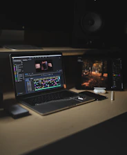 black and silver laptop computer on white table