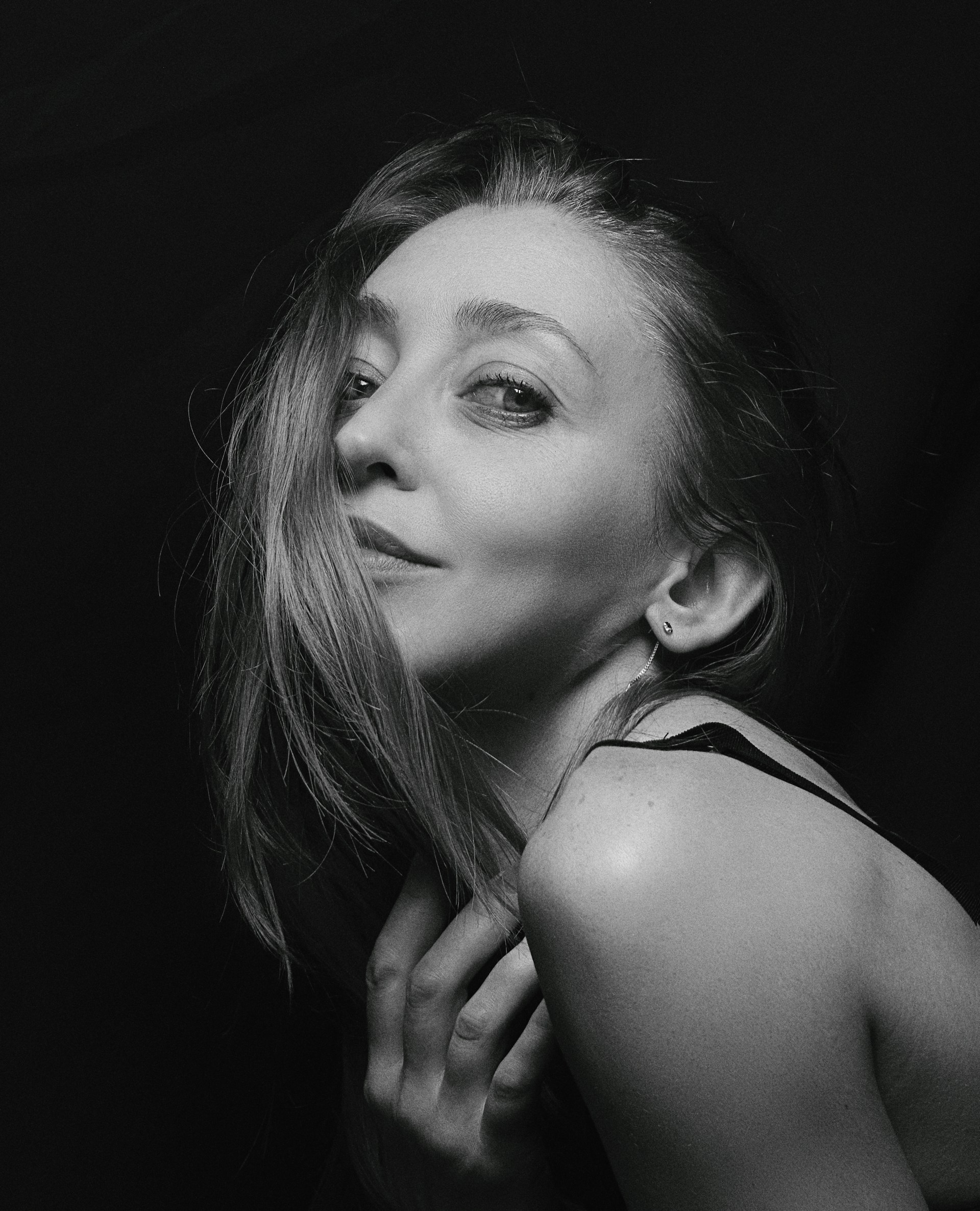 black and brown leather padded tub sofa