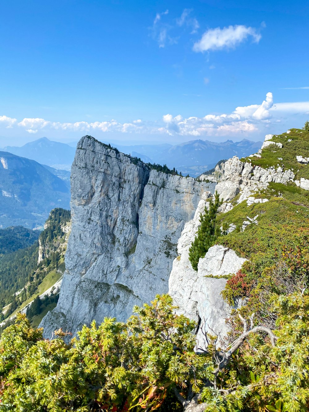 a view of the mountains from the top of a mountain