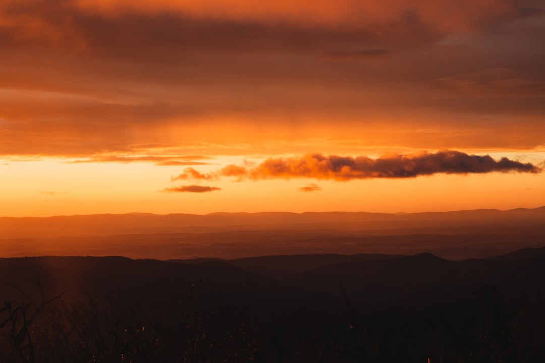 silhouette of mountains during sunset