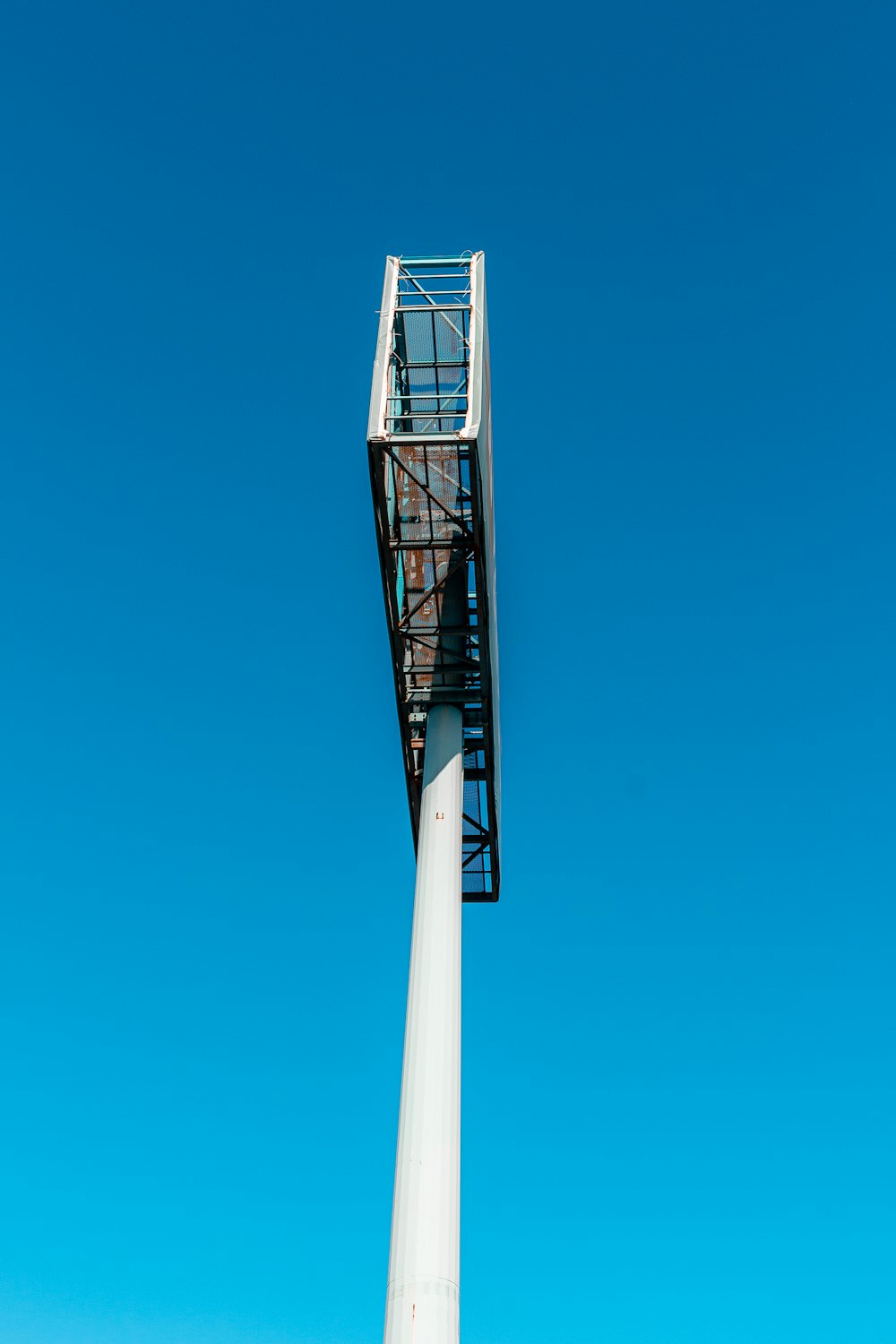 white and black tower under blue sky during daytime