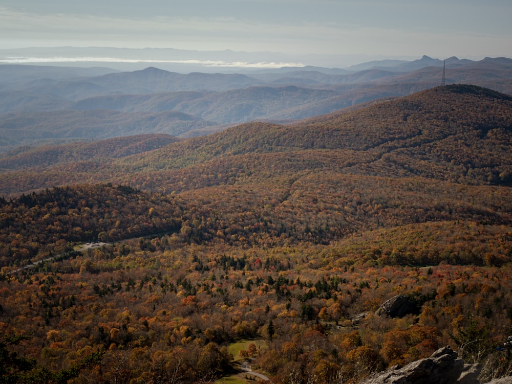 aerial view of green and brown mountains during daytime