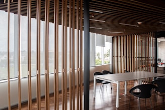 white and brown window blinds