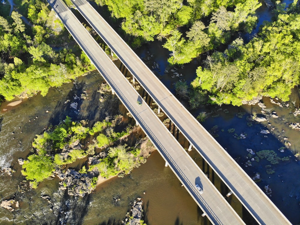 gray metal bridge over river