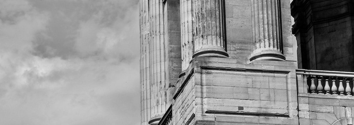 grayscale photo of concrete building