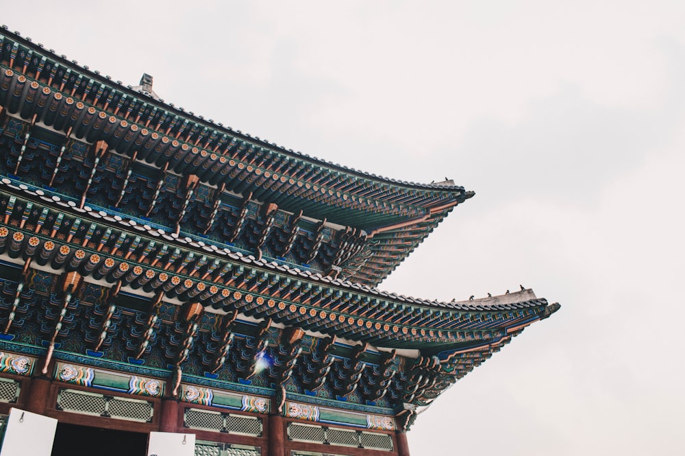 red and black temple under white sky during daytime