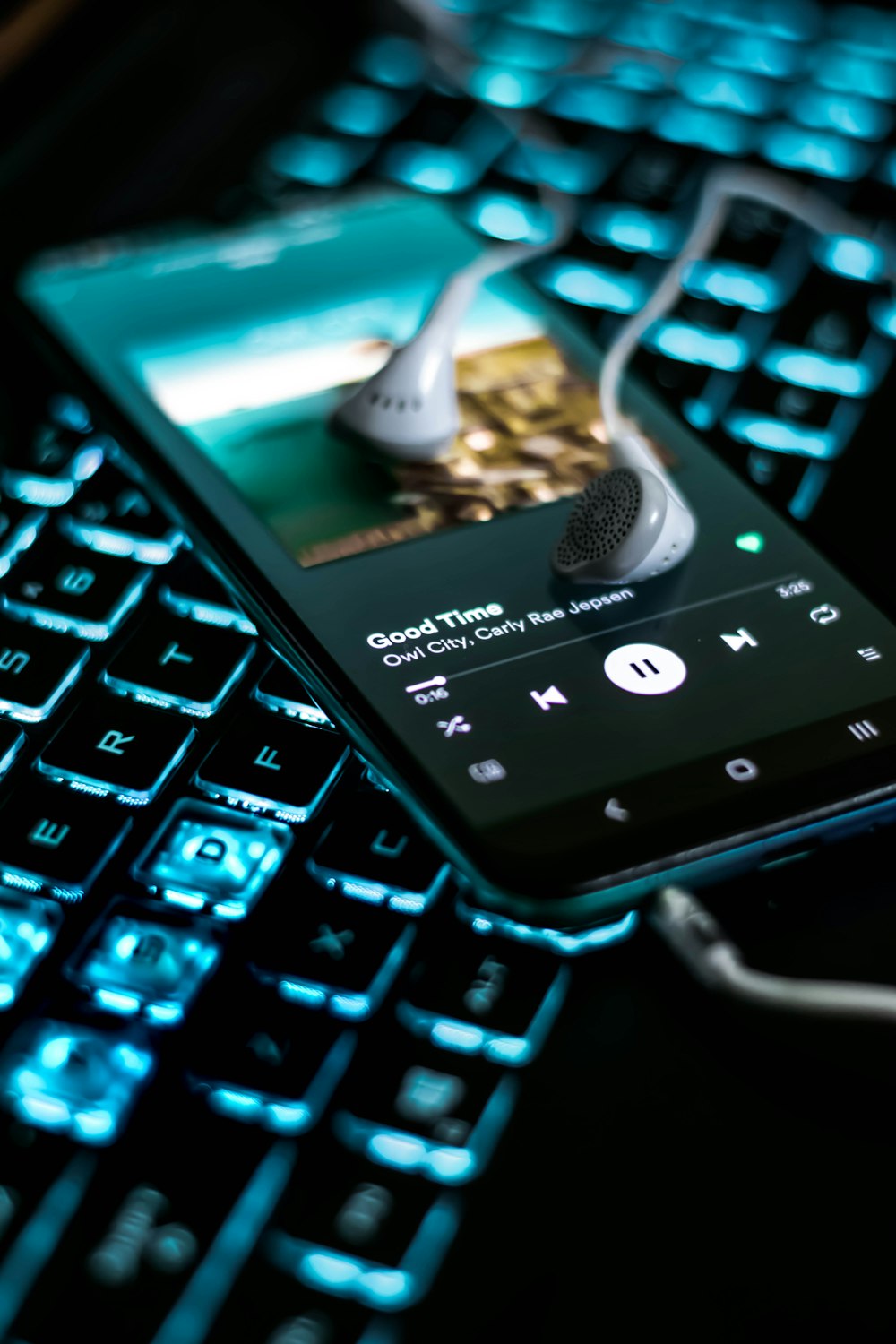 black lg android smartphone on black computer keyboard