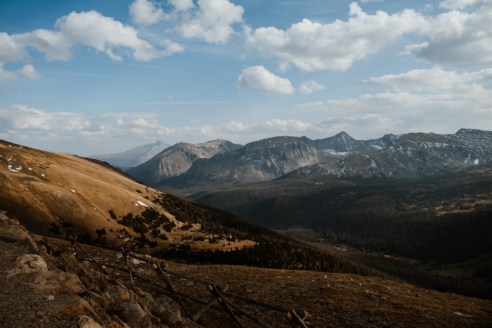 brown and green mountains under blue sky during daytime