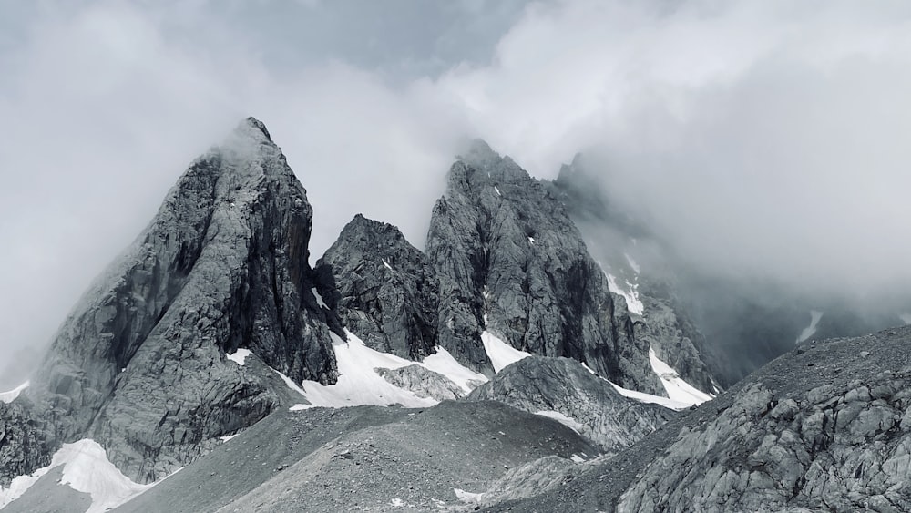 snow covered mountain during daytime