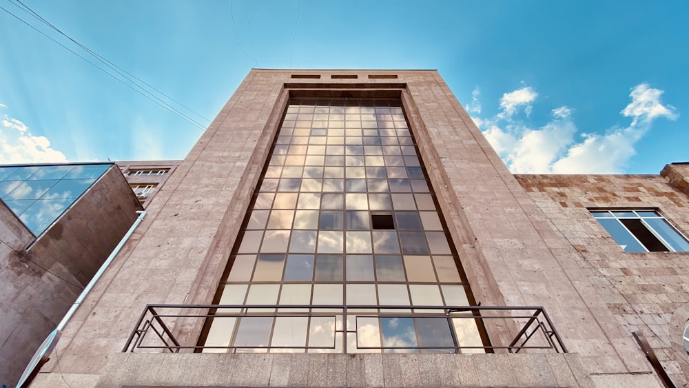 white and brown concrete building under blue sky during daytime