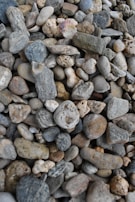 Palisades and pebbles displayed together, illustrating the range of shapes and natural textures we offer.
